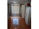 Kitchen with wood floors, granite countertops, stainless steel appliances and a window at 6579 Alford Way, Lithonia, GA 30058