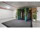 Unique room featuring custom entryway decorated with lush greenery and stone art on the wall at 2660 Peachtree Nw Rd # 18G, Atlanta, GA 30305