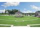 Community amphitheater with gazebo and a large lawn area for performances at 5810 Collier Bridge Ln, Hoschton, GA 30548