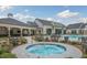 Hot tub with lounge area and seating, perfect for relaxing after a long day at 5810 Collier Bridge Ln, Hoschton, GA 30548