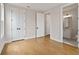 Spacious bedroom with hardwood floors and an en-suite bathroom at 509 Pearl St, Cumming, GA 30040