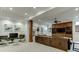 Finished basement with a sectional sofa, media center and game area at 879 Big Horn Hollow, Suwanee, GA 30024