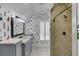 Bathroom with lighthouse wallpaper, double vanity, and large shower at 879 Big Horn Hollow, Suwanee, GA 30024