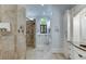 Spa-like bathroom with large walk-in shower and tiled flooring at 879 Big Horn Hollow, Suwanee, GA 30024