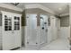 Elegant bathroom with a large walk-in shower and white subway tile at 879 Big Horn Hollow, Suwanee, GA 30024