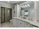 Bathroom with a large vanity and a walk-in shower at 879 Big Horn Hollow, Suwanee, GA 30024