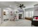 Spacious bedroom with built-in desk, large window, and full bed at 879 Big Horn Hollow, Suwanee, GA 30024