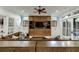 Spacious basement Gathering room with sectional sofa and access to outdoor space at 879 Big Horn Hollow, Suwanee, GA 30024