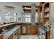 Modern home bar with granite countertop and stainless steel appliances at 879 Big Horn Hollow, Suwanee, GA 30024