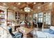 Spacious home office with wood-paneled walls and custom built-ins at 879 Big Horn Hollow, Suwanee, GA 30024