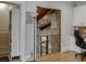 Open bookcase and view of a second story overlook at 879 Big Horn Hollow, Suwanee, GA 30024