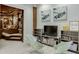 Cozy living space next to a home theater, with bookshelves and seating at 879 Big Horn Hollow, Suwanee, GA 30024