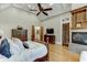 Spacious main bedroom with hardwood floors and a fireplace at 879 Big Horn Hollow, Suwanee, GA 30024