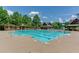 Resort-style pool with multiple lap lanes and a spacious deck at 879 Big Horn Hollow, Suwanee, GA 30024