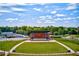 Spacious outdoor amphitheater with a well-maintained lawn, perfect for community events and performances at 703 Hammond Dr, Woodstock, GA 30188