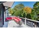 Spacious deck with sectional sofa and scenic wooded views at 703 Hammond Dr, Woodstock, GA 30188