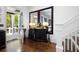 Elegant entryway with hardwood floors and large mirrors at 703 Hammond Dr, Woodstock, GA 30188