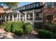 Townhome with private deck, fenced yard and manicured landscaping at 703 Hammond Dr, Woodstock, GA 30188
