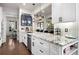 Spacious kitchen with granite countertops and stylish backsplash at 703 Hammond Dr, Woodstock, GA 30188