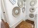 Elegant staircase with dark wood treads and decorative wall mirrors at 703 Hammond Dr, Woodstock, GA 30188