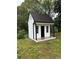 This detached playhouse offers a great private play area, or even a detached office! at 1368 New Hope Rd, Lawrenceville, GA 30045
