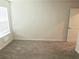 Bright bedroom featuring neutral walls, carpet and a window at 3978 Lake Manor Way, Atlanta, GA 30349