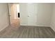 Cozy carpeted bedroom with neutral walls and closet at 3978 Lake Manor Way, Atlanta, GA 30349