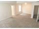This bedroom has neutral walls, carpet and trim and ample natural light and two doorways at 3978 Lake Manor Way, Atlanta, GA 30349
