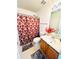 Bathroom featuring a vanity with a white countertop, and floral shower curtain at 2717 Kristen Ct, Conyers, GA 30012