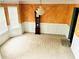 Formal dining room with elegant trim, decorative walls, and light colored carpet at 2717 Kristen Ct, Conyers, GA 30012