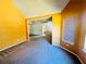 A room with neutral carpeting, and a window allowing lots of natural light at 2717 Kristen Ct, Conyers, GA 30012