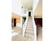Spacious entrance with white staircase and large windows, features colored walls on the first floor at 2717 Kristen Ct, Conyers, GA 30012