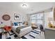 Bright bedroom with colorful decor, cozy bedding, and playful accents at 802 Oak Promenade Ln, Canton, GA 30115