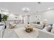 Upstairs living room featuring comfortable seating and natural lighting at 802 Oak Promenade Ln, Canton, GA 30115
