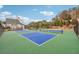 Well-maintained pickleball courts surrounded by greenery, perfect for recreational fun and community engagement at 802 Oak Promenade Ln, Canton, GA 30115