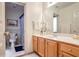 Well-appointed bathroom with a single vanity and shower at 3559 Gus Way, Powder Springs, GA 30127