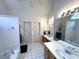 Spacious bathroom with double vanity, soaking tub, and separate shower at 3559 Gus Way, Powder Springs, GA 30127