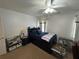 Cozy bedroom with a double bed and ample storage at 3559 Gus Way, Powder Springs, GA 30127