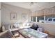 Bright sunroom featuring comfortable seating and large windows at 3559 Gus Way, Powder Springs, GA 30127