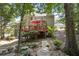The backyard features a spacious deck, ideal for outdoor entertaining and enjoying the serene surroundings at 1400 Lamont Cir, Dacula, GA 30019