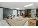 Spacious unfinished basement area is ready for customization with existing lighting and exterior access at 1400 Lamont Cir, Dacula, GA 30019