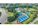 Aerial view of entire community featuring pool, tennis courts, lake, and clubhouse at 1400 Lamont Cir, Dacula, GA 30019