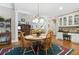 Cozy dining area featuring a round table, hardwood floors, and an open layout at 1400 Lamont Cir, Dacula, GA 30019