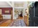 Grand foyer featuring hardwood floors, high ceilings, staircase and an open view to the living spaces at 1400 Lamont Cir, Dacula, GA 30019