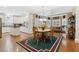Bright kitchen with white cabinetry, modern appliances, and a sunny breakfast nook at 1400 Lamont Cir, Dacula, GA 30019
