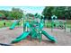 Community playground featuring modern equipment, including slides and climbing structures, perfect for children at 1400 Lamont Cir, Dacula, GA 30019