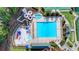 Aerial view of community pool featuring lap lanes, slides, play area and plenty of seating at 1400 Lamont Cir, Dacula, GA 30019