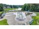 Community splash pad and lakeside recreation area with various spray features and ample seating, perfect for families at 1400 Lamont Cir, Dacula, GA 30019