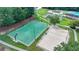 Community basketball and volleyball court area with trees surrounding the perimeter at 1400 Lamont Cir, Dacula, GA 30019