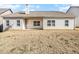 House with covered patio and fenced-in backyard at 276 Villa Grande Dr, Locust Grove, GA 30248